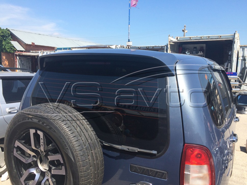 спойлер на ниву тревел